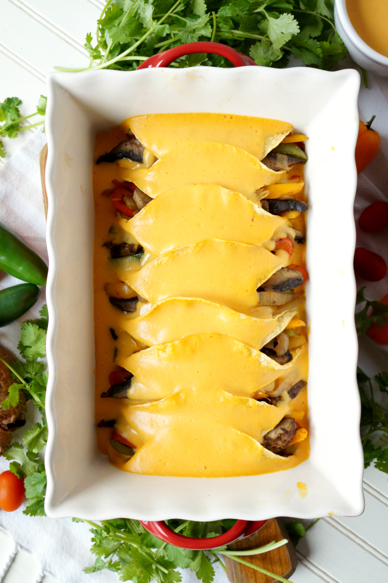 vegan fajita enchiladas with cheesy sauce | The Baking Fairy