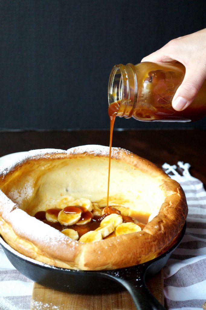 Dutch baby pancake with bananas and coconut caramel The Baking Fairy