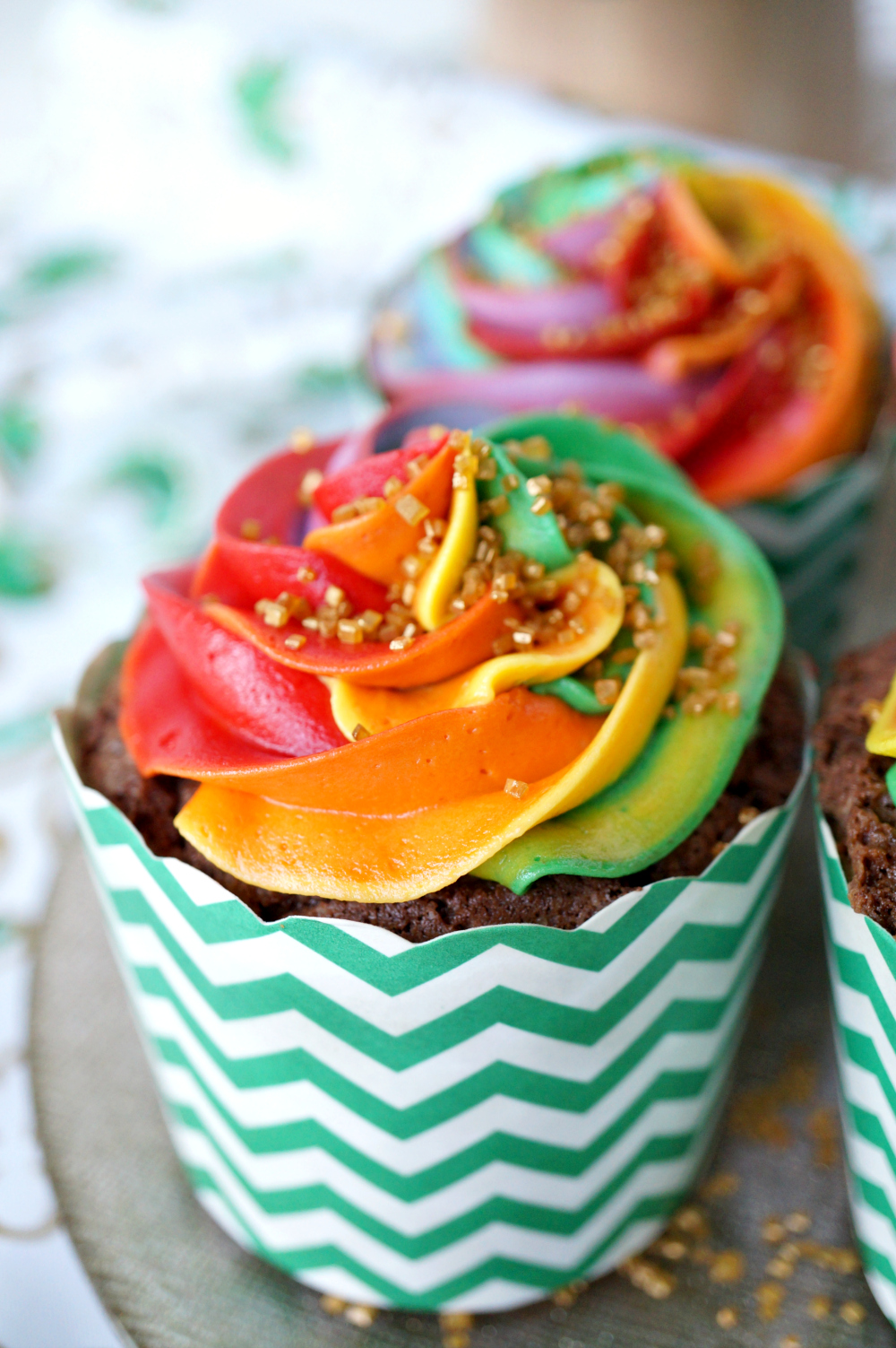 chocolate Bailey's cupcakes with rainbow frosting | The Baking Fairy