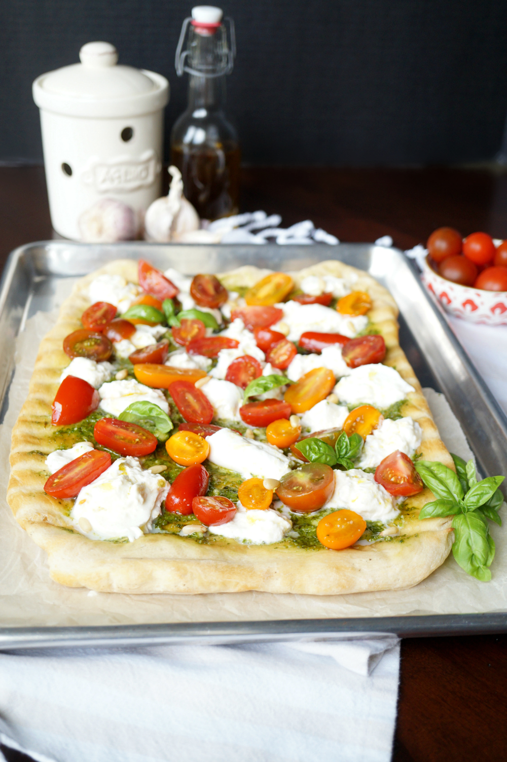 grilled pizza with pesto, burrata, and baby tomatoes | The Baking Fairy