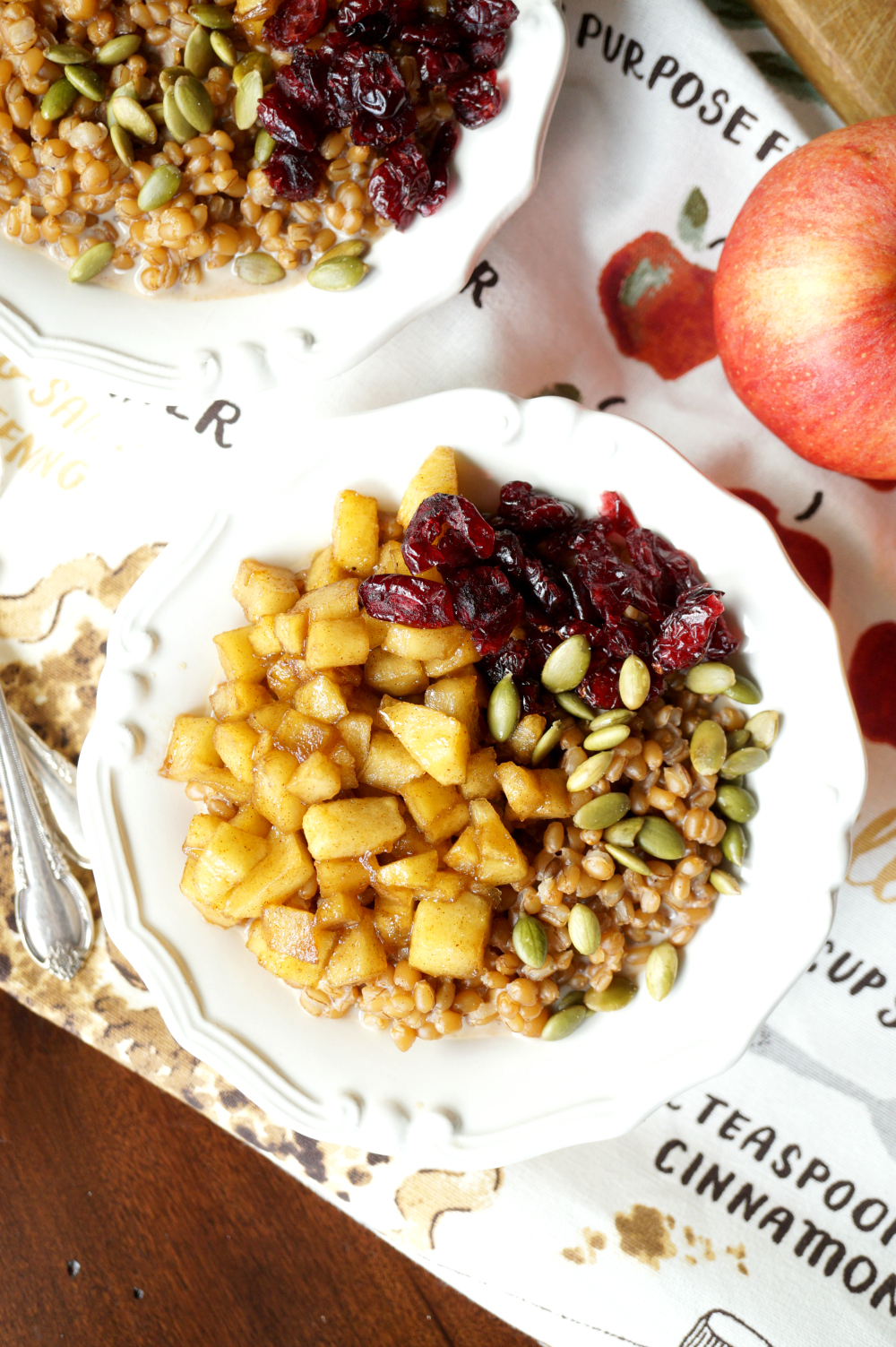 caramelized apple wheatberry porridge with cranberries and pepitas #AppleWeek | The Baking Fairy