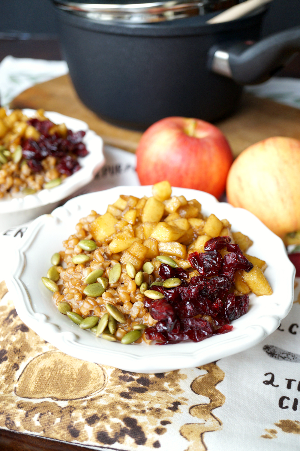 caramelized apple wheatberry porridge with cranberries and pepitas #AppleWeek | The Baking Fairy