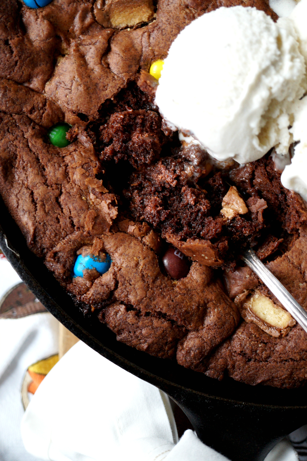 Halloween candy chocolate skillet cookie | The Baking Fairy