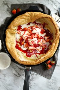 vanilla bean dutch baby with strawberry hibiscus syrup | The Baking Fairy #SpringSweetsWeek #ad