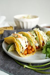 BBQ chickpea tacos close up topped with slaw