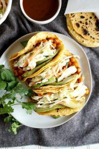 three BBQ chickpea tacos on a plate from overhead