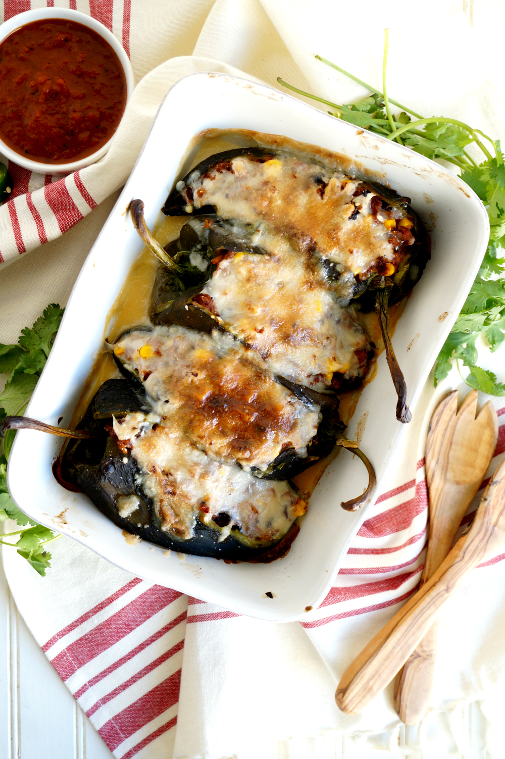 overhead shot of stuffed poblano peppers