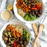 bowls of roasted vegetables, salad, and quinoa
