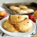 strawberry peach hand pies on a plate