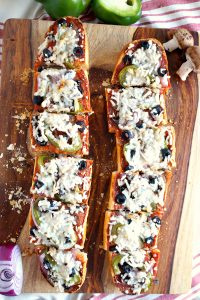 overhead shot of cut french bread pizza