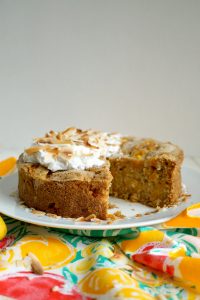 mango coconut snack cake with slice missing