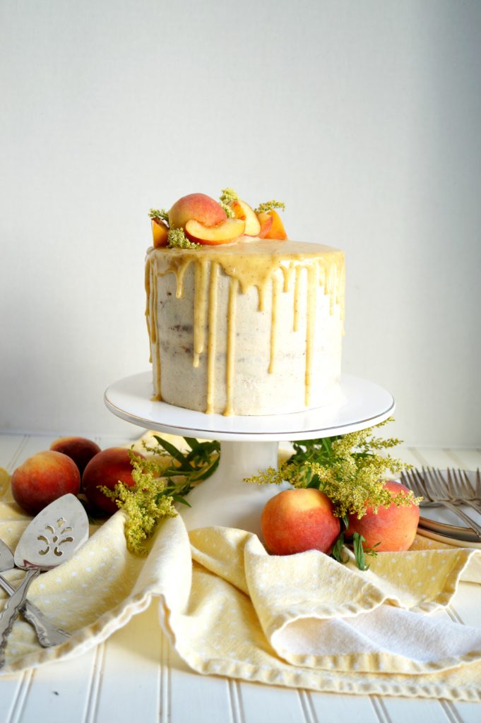peaches & cream cake on stand