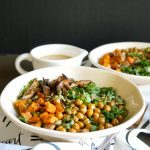 bowl of kale salad with sweet potato, chickpeas, mushrooms