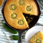 overhead jalapeno cornbread with slice cut