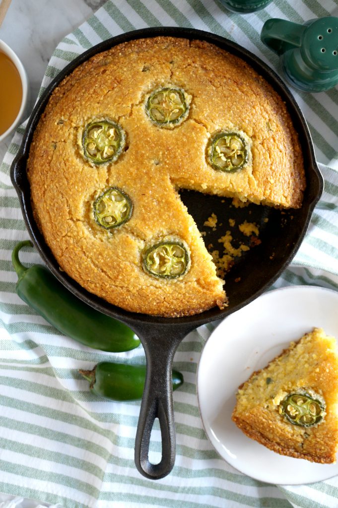 overhead jalapeno cornbread with slice cut