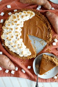 overhead sweet potato tart with slice cut