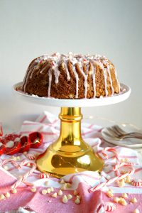 peppermint crunch bundt cake on stand