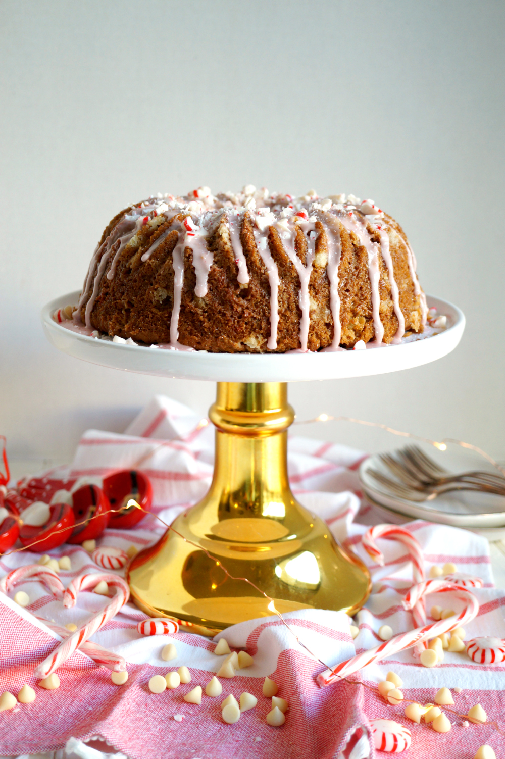 peppermint crunch bundt cake on stand