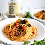 plate of pasta puttanesca spaghetti