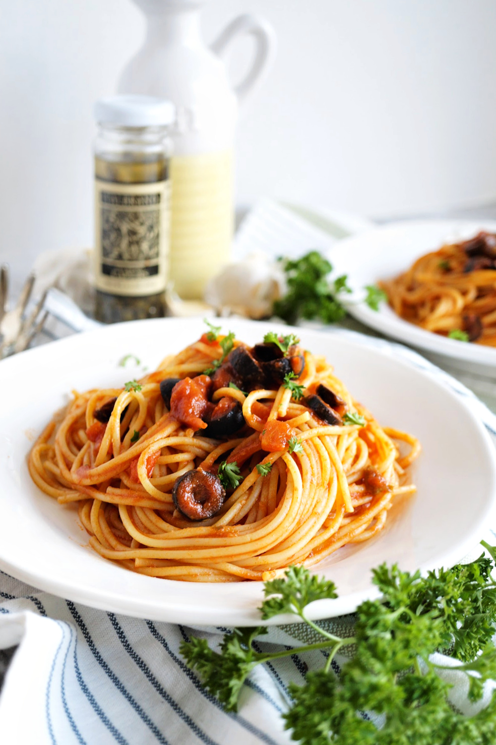 plate of pasta puttanesca spaghetti