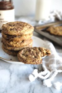 chocolate tahini cookie with bite