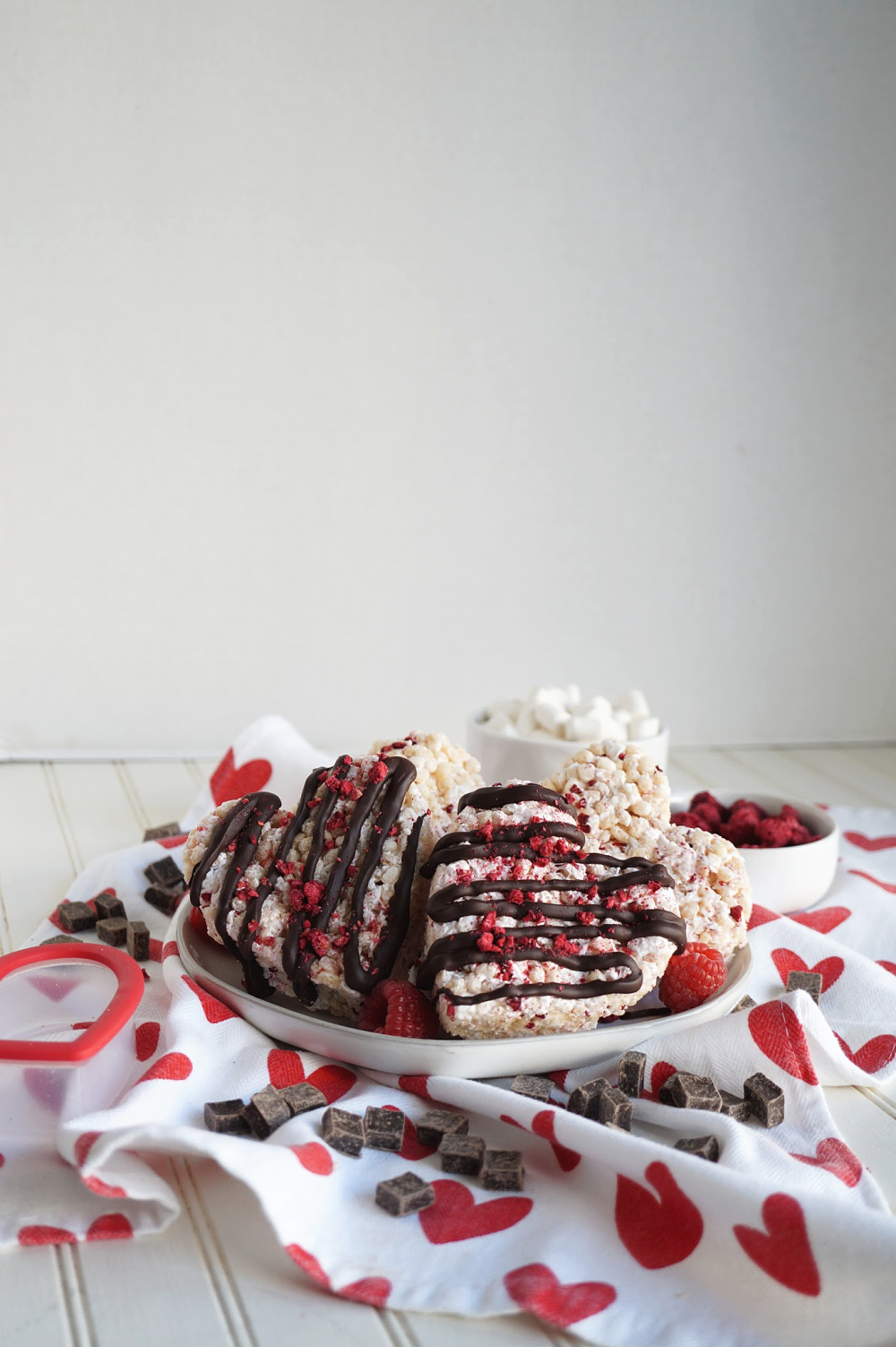 raspberry rice krispie treats on a plate