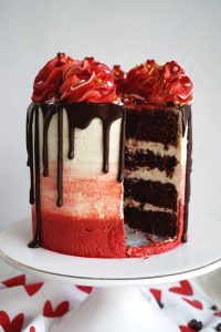 red velvet cake with slice cut