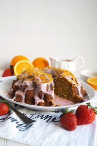 orange poppyseed bundt cake with slice cut