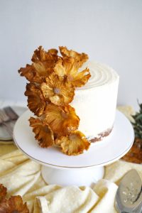 vegan hummingbird cake on stand