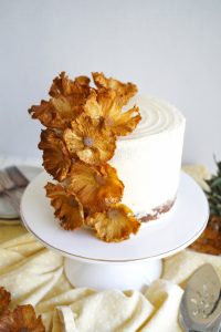 vegan hummingbird cake on stand