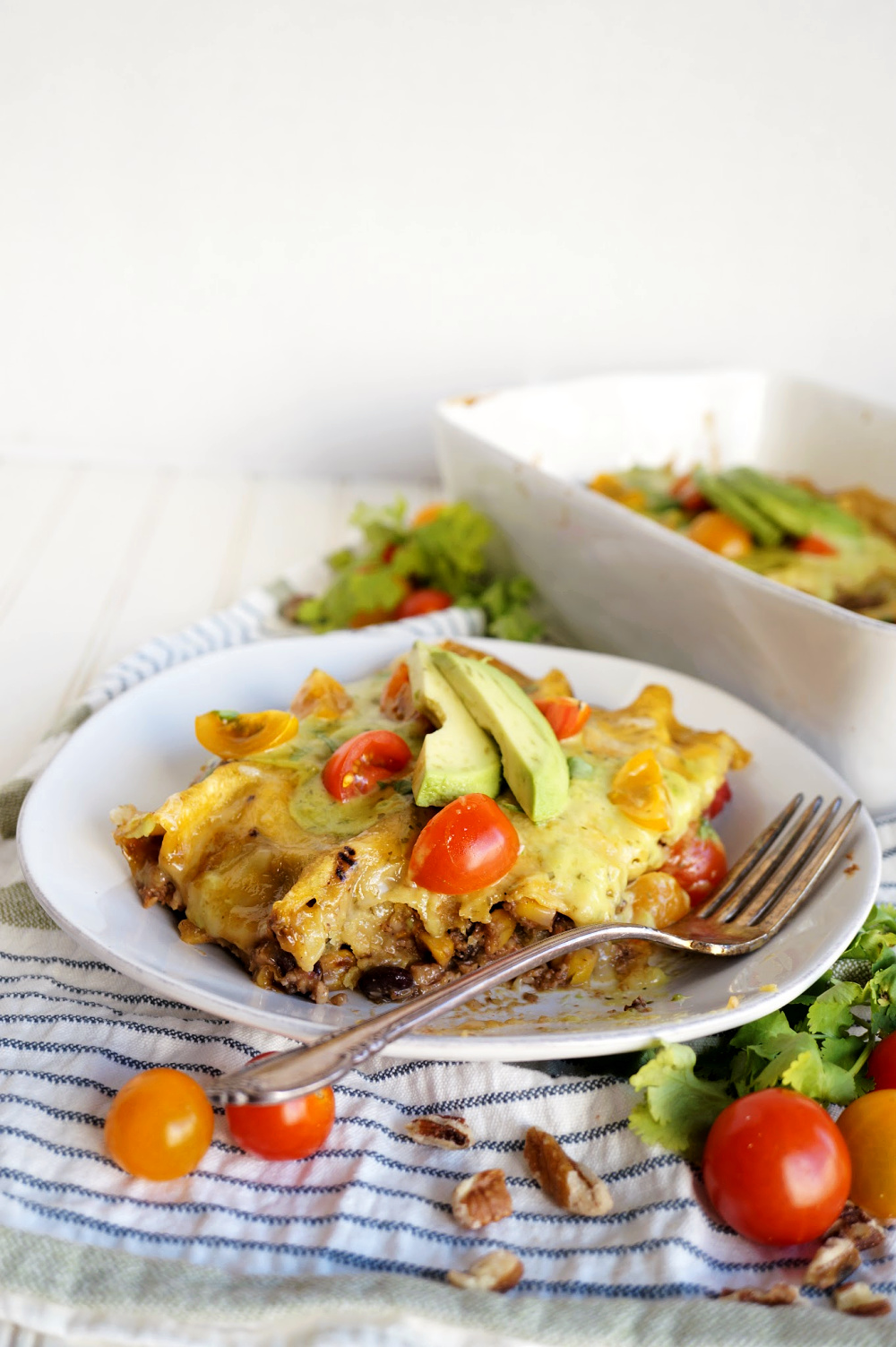 eating enchiladas from plate