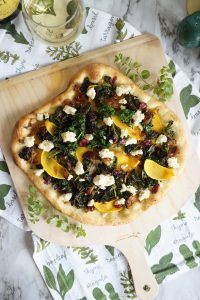 overhead shot of pizza with kale and butternut squash