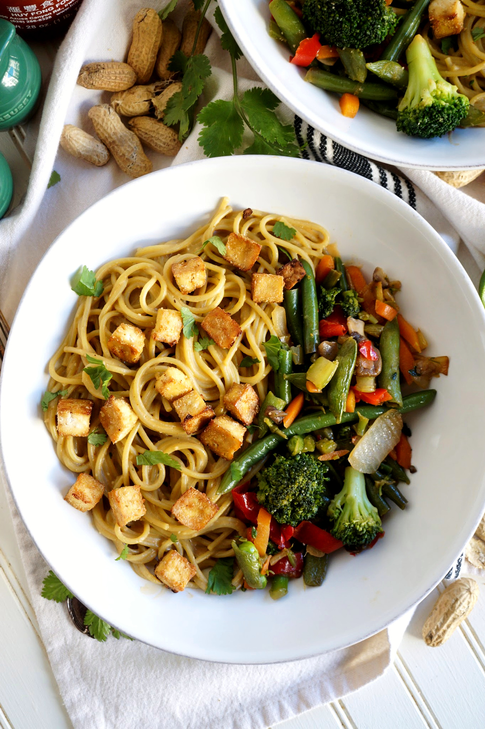 overhead shot of peanut noodles with stir fry