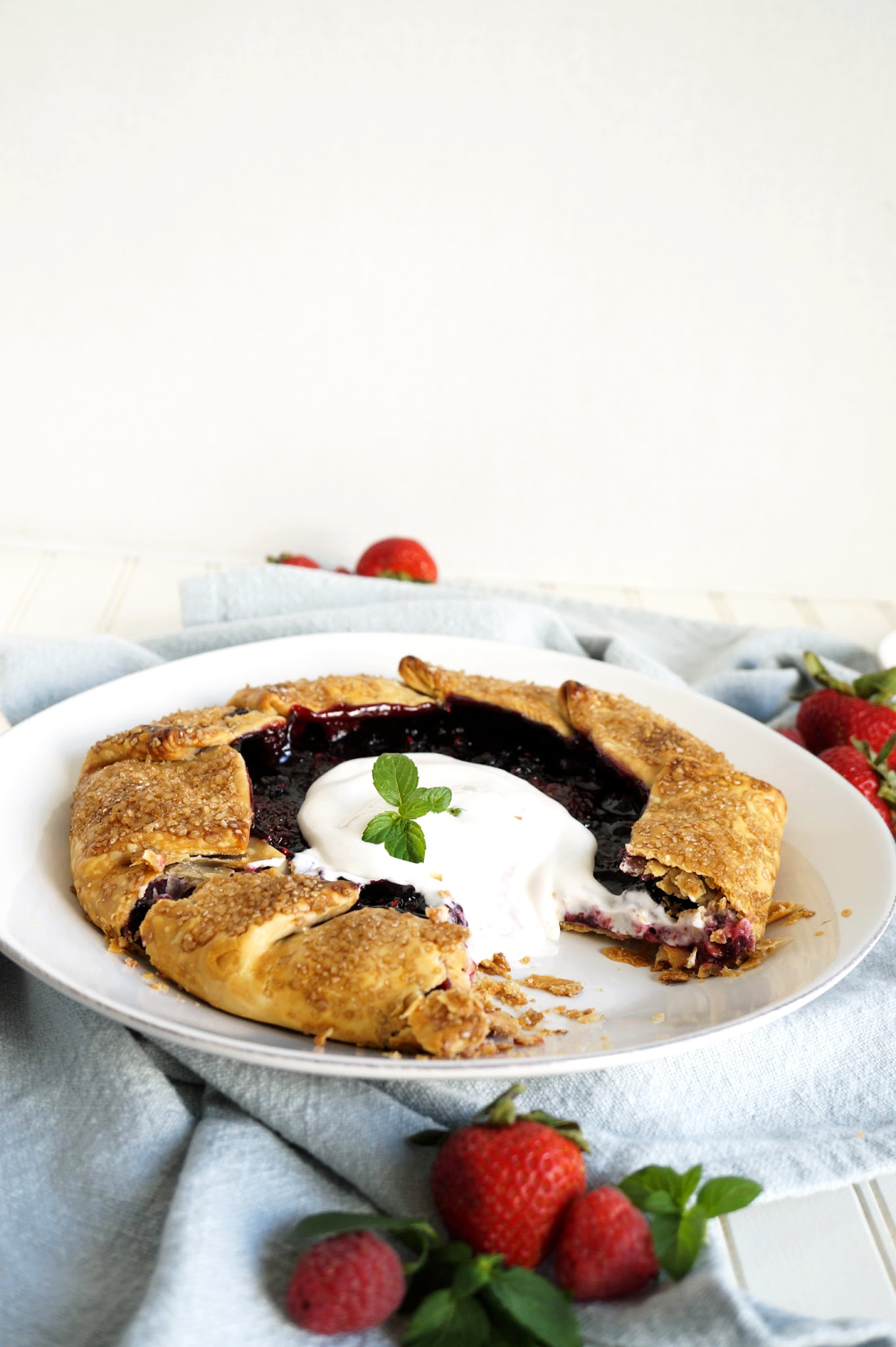 summer berry galette with slice cut