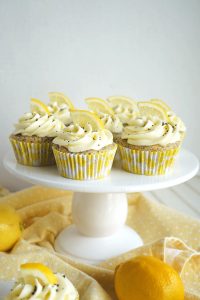 lemon poppyseed cupcakes on cake stand