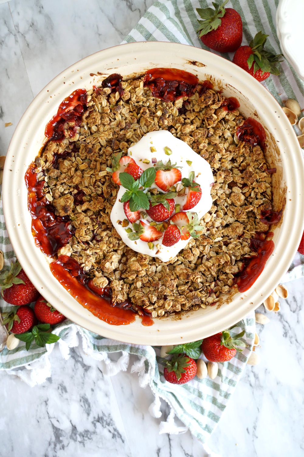 overhead shot of strawberry pistachio crisp