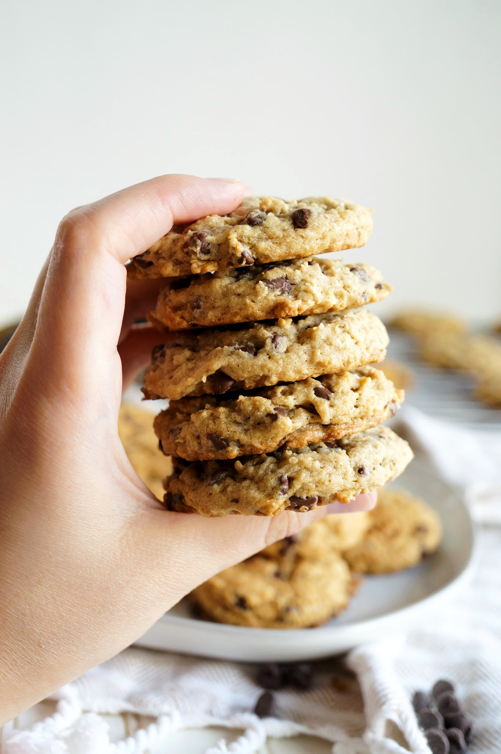 stack of banana cookies in hand