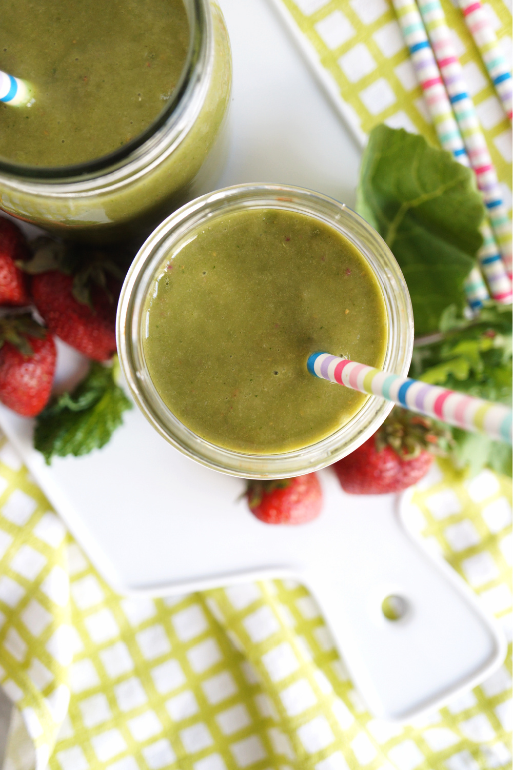 overhead shot of green smoothie in a cup