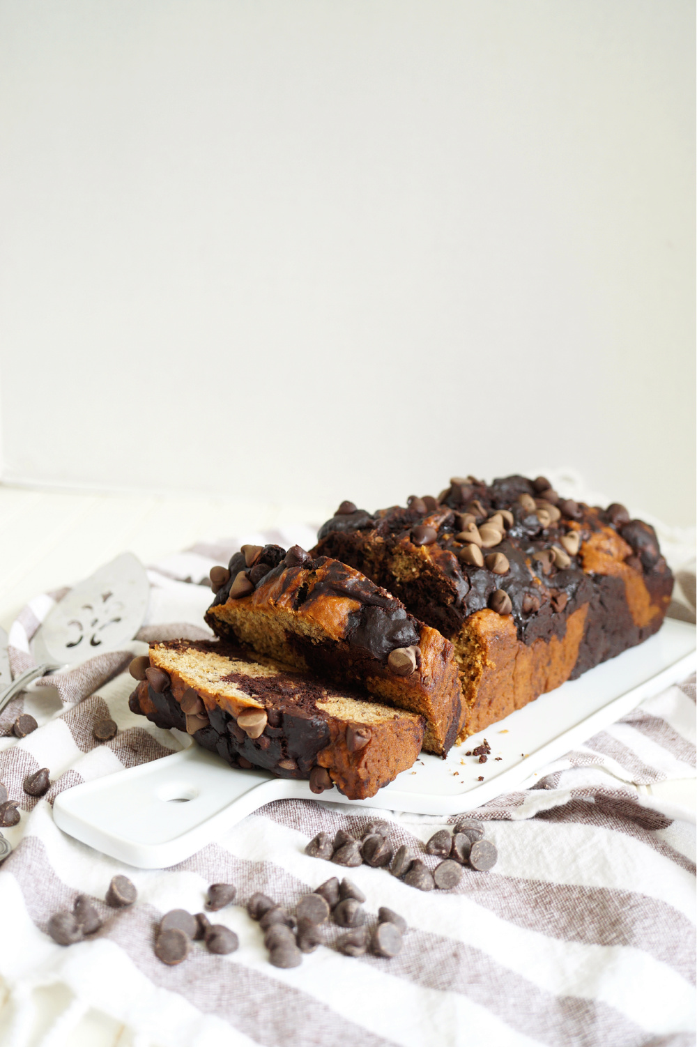 sliced marble banana bread on white tray