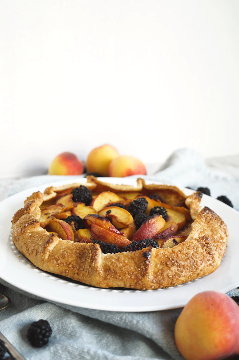 blackberry peach galette on serving plate