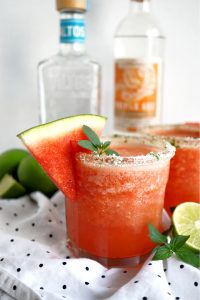 close up of a cup of watermelon mint frozen margaritas