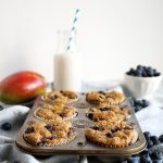 blueberry mango muffins in tin