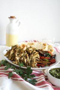 plate of herb skewers with grilled vegetables