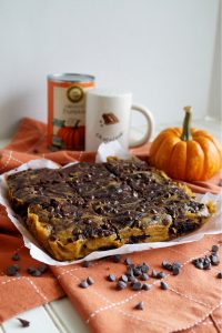 pumpkin swirl brownies on orange towel