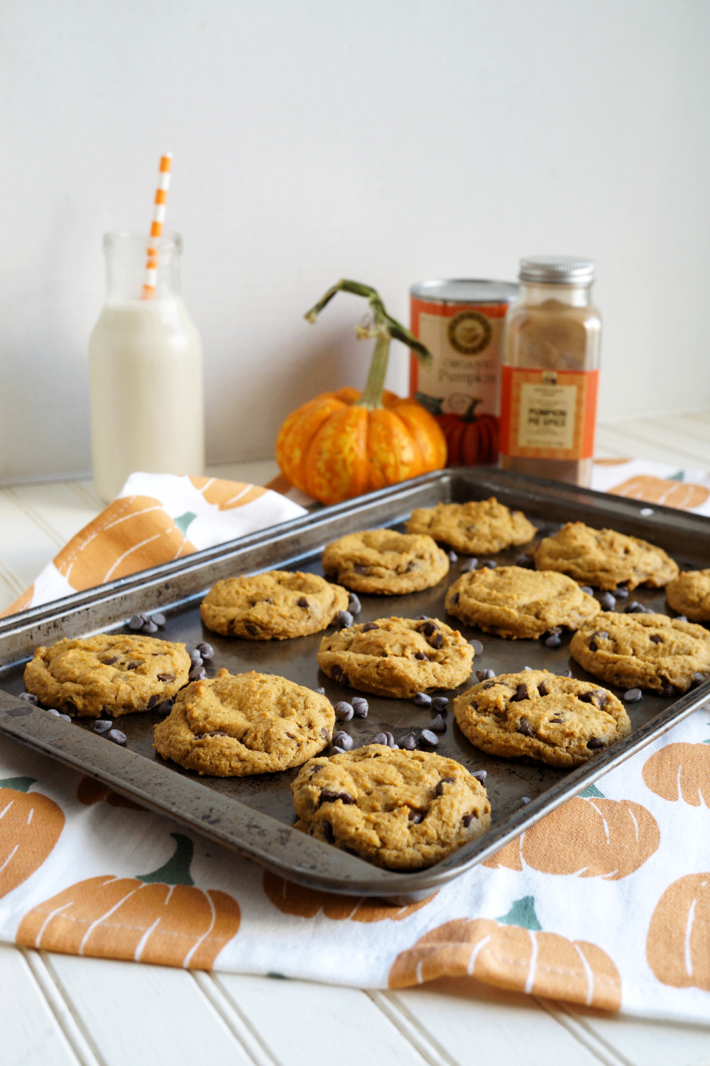 pumpkin chocolate chip cookies on cookie sheet