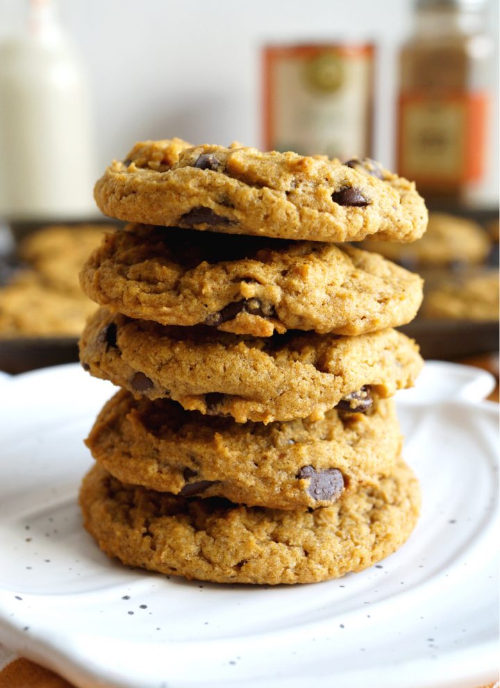 close up of a stack of pumpkin chocolate chip cookies