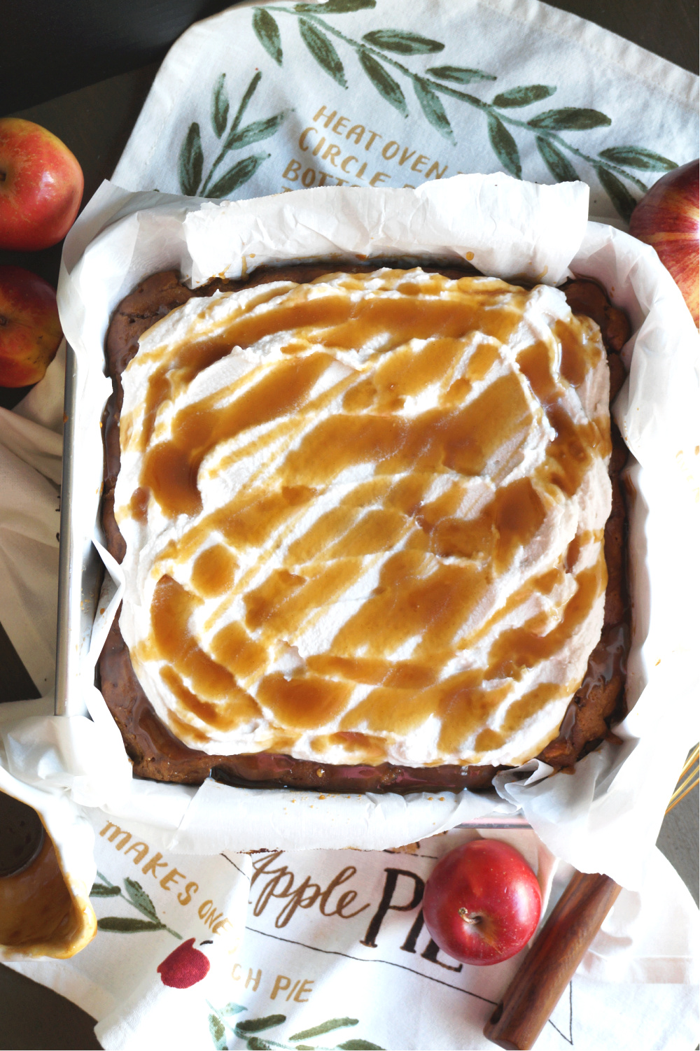 overhead shot of salted caramel apple cake with caramel drizzle