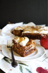 salted caramel apple cake slice on a plate