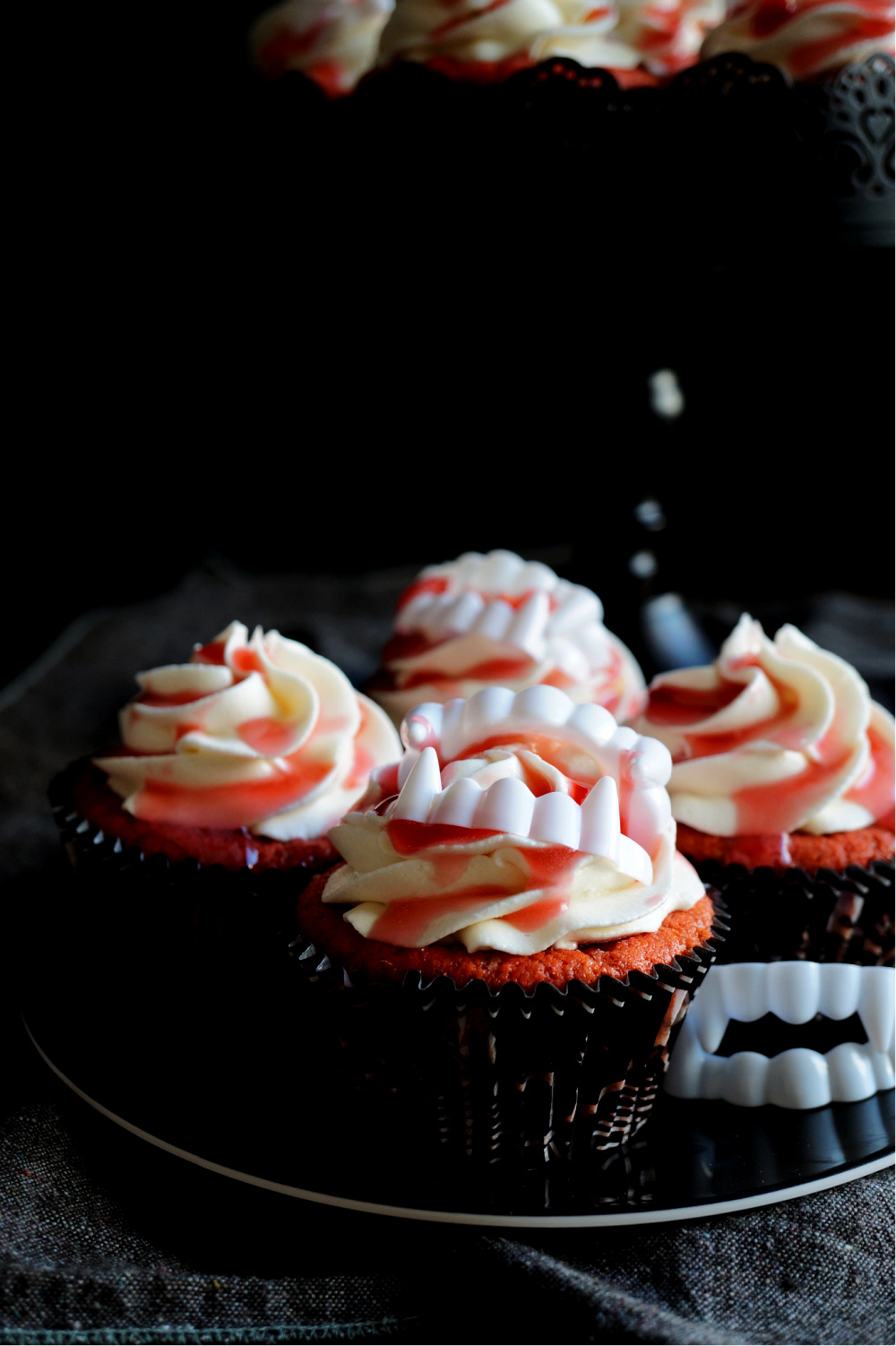 cherry pie vampire cupcakes on a plate