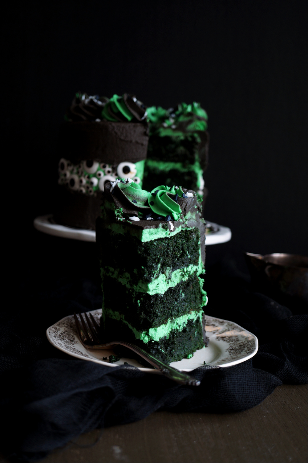 slice of green velvet cake on plate